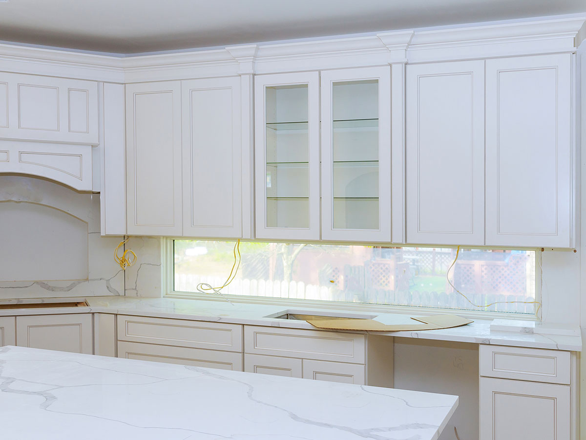 Kitchen with white cabinets.