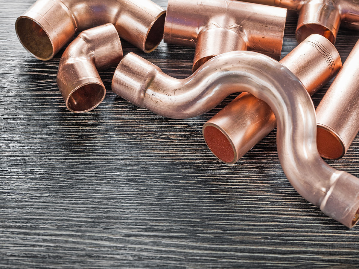Copper pipe looks great but requires more skill - the same effect can be achieved with paint on pvc pipes.