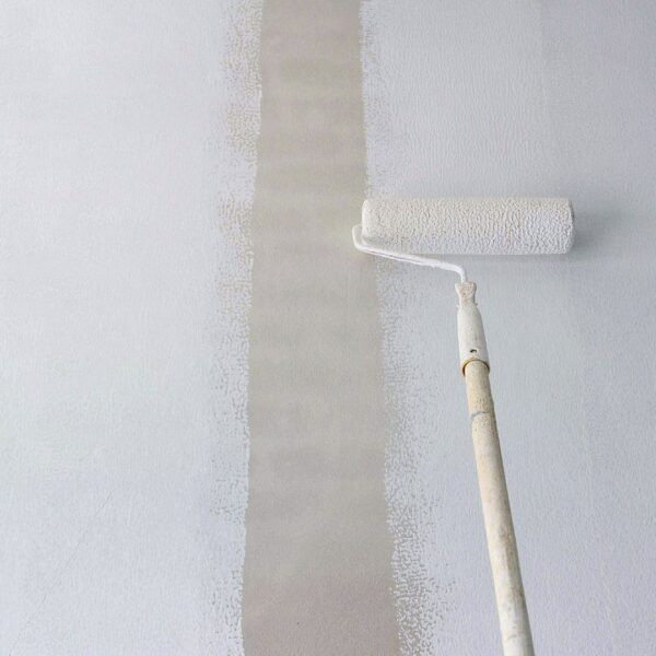 putting primer on a wall